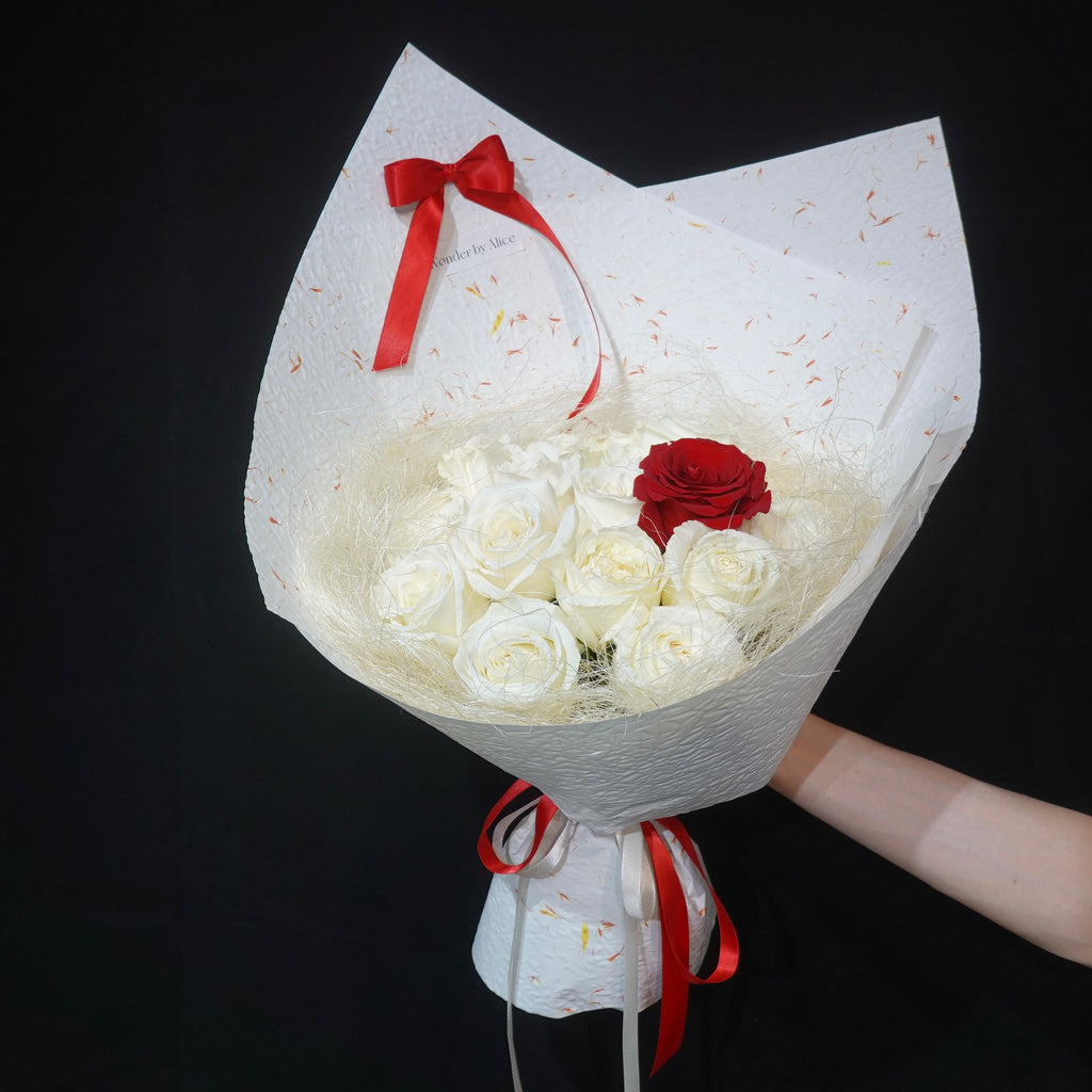 White roses with a single red rose bouquet by Wonder by Alice, Canberra